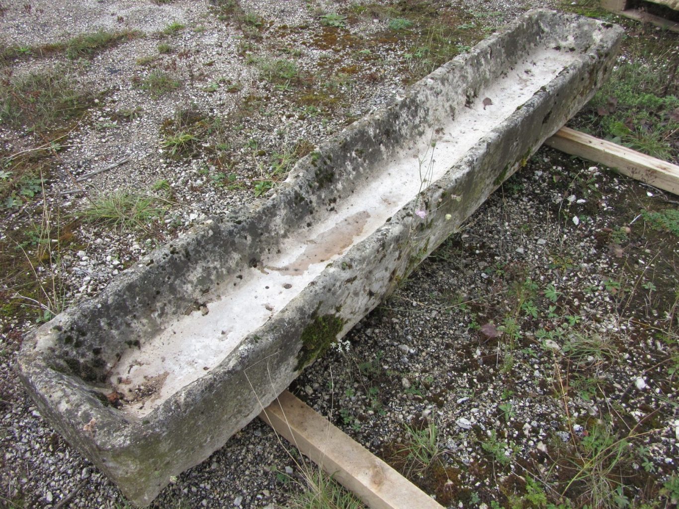 long antique sandstone feeding trough
